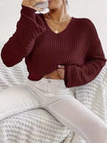 Solid colour long sleeve pullover for women in loose casual fit, shown in available colour options.