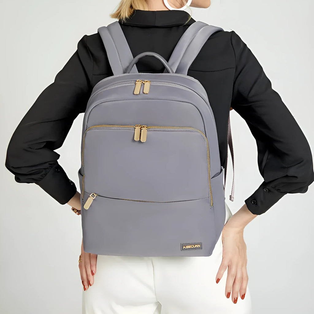 Women's Oxford cloth backpack in black with anti-theft zips and breathable back panel