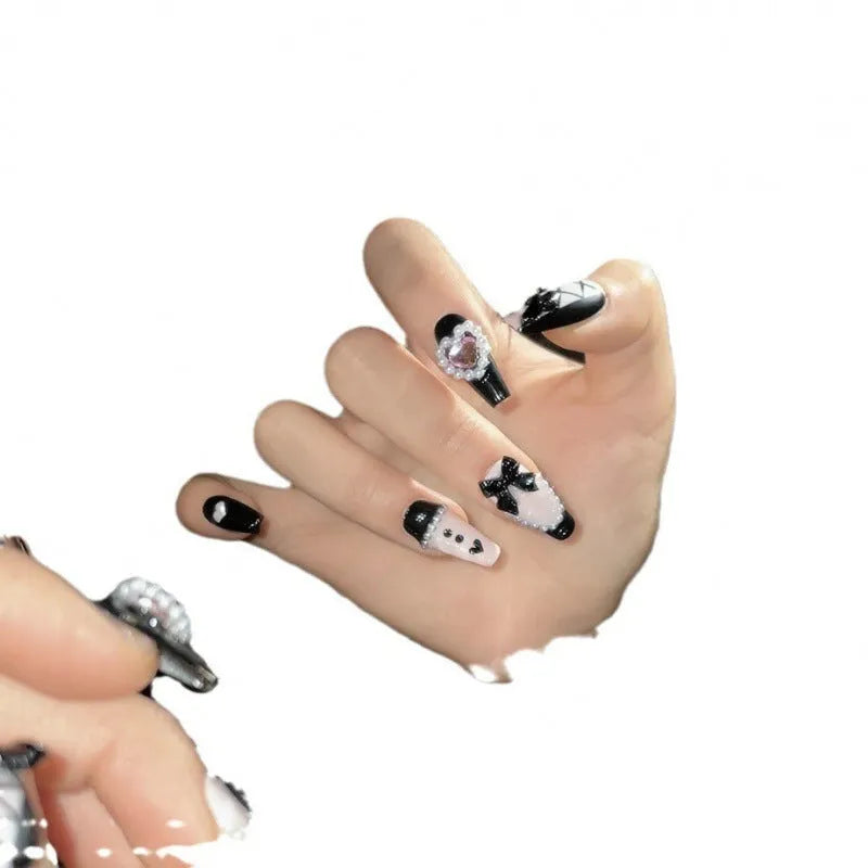 Black and pink heart hand-painted manicure set with bow and XINGX patterns on detachable plastic armour suit