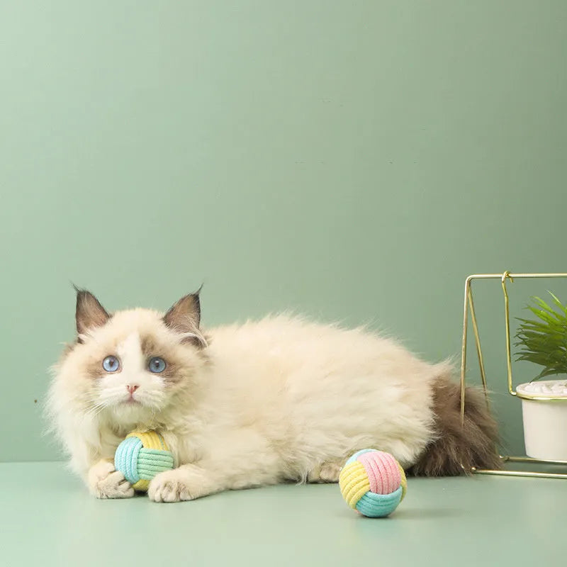 Handmade blue pink cotton cat hair ball plush toy measuring 5cm for interactive pet play