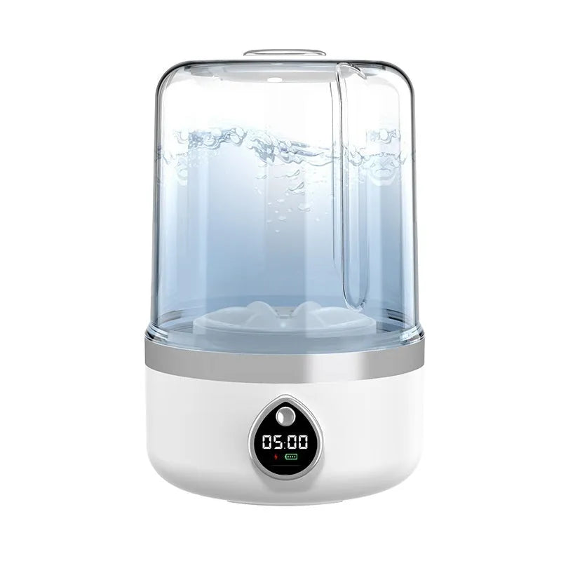 White portable USB charging mini washing machine on a countertop