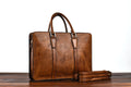 Men's 14-inch horizontal leather handbag in khaki or black with zipper closure