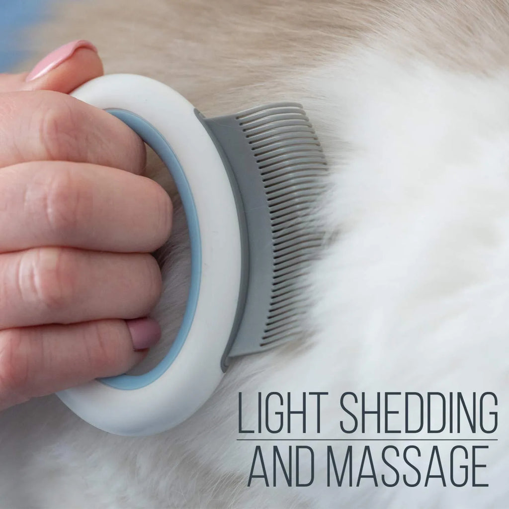 Blue pet grooming comb with ergonomic handle for deshedding and dematting cat and dog hair.