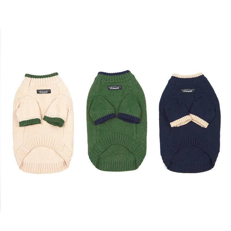 British style wool pet sweater on a small dog, showing the two-leg design in Crown Blue colour.