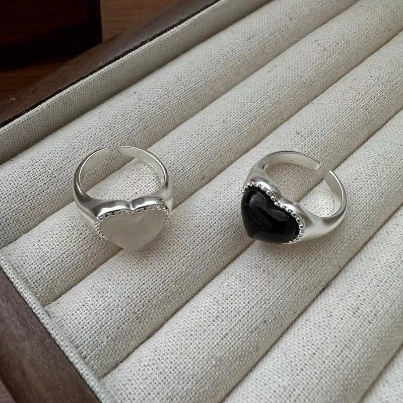 Adjustable sterling silver ring with heart-shaped black agate stone and open mouth design