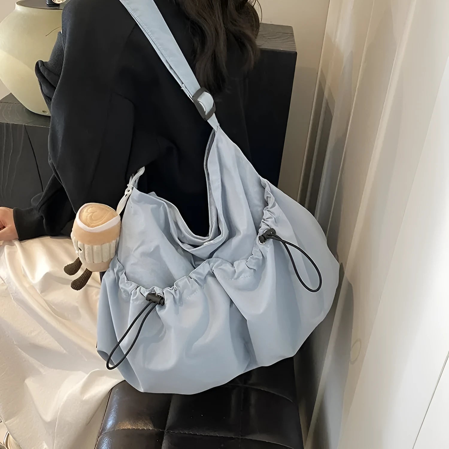 Ultra-light pleated crossbody student bag in polyester with folding design and internal phone pocket