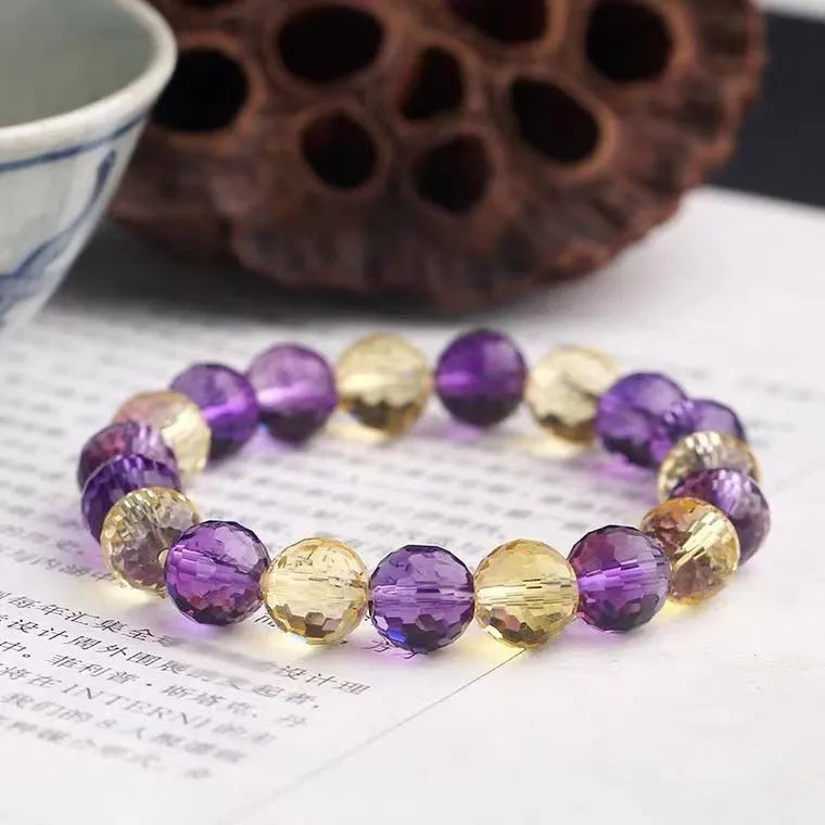 Crystal ametrine bracelet showing 128-cut faceting on beads with choice of amethyst, ametrine or citrine colours