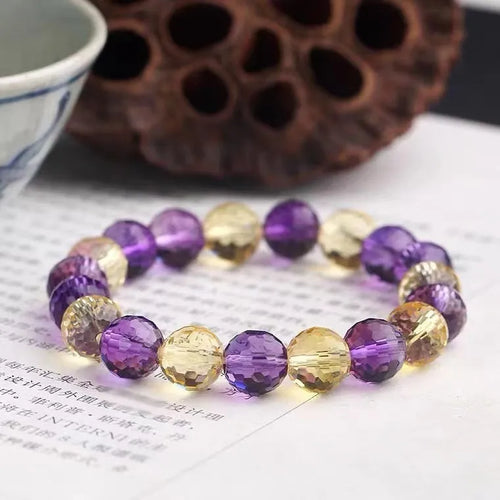 Crystal ametrine bracelet showing 128-cut faceting on beads with choice of amethyst, ametrine or citrine colours