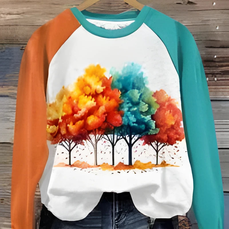 Green women's hoodie with a detailed 3D cartoon character print on the front.
