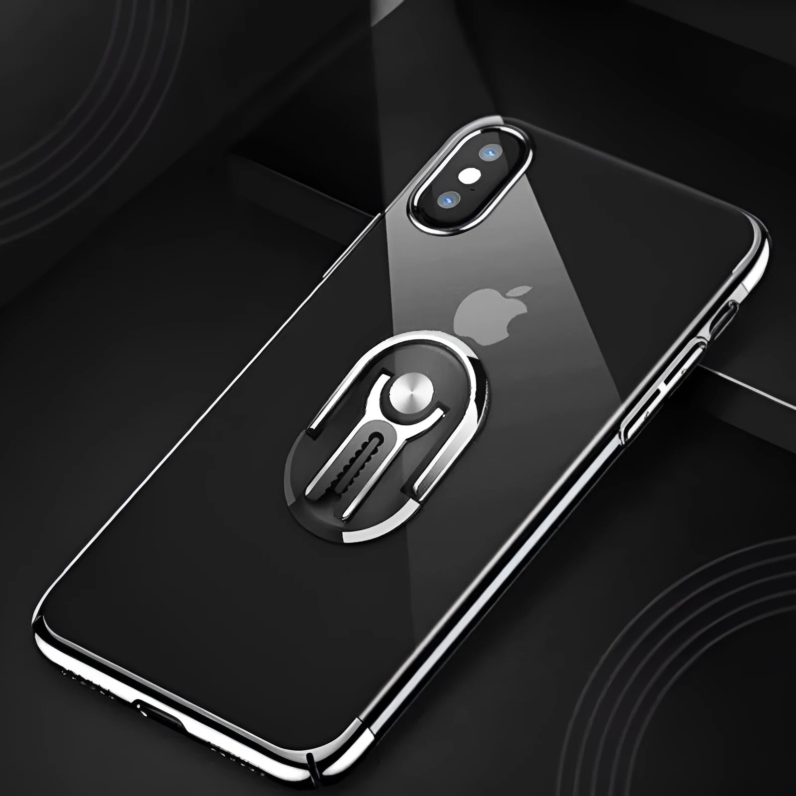 Universal magnetic car phone bracket mounted on vehicle air vent showing 360-degree rotation adjustment