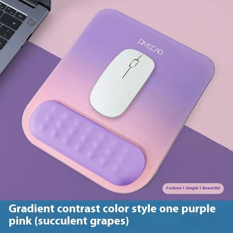 Ergonomic mouse pad with raised wrist support in cloth silicone material showing colour options
