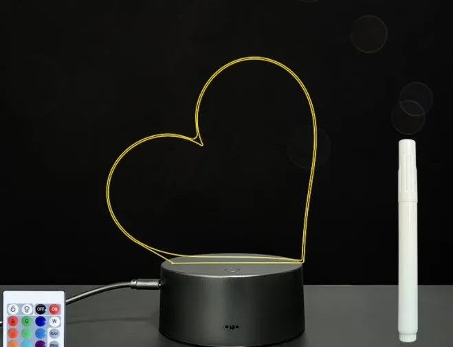 3D acrylic message board lamp with black crack base displaying handwritten text and glowing with multi-colour LED light