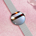 Female smart watch with circular dial, metal strap, and color screen showing heart rate data