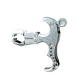 Close-up of a zinc alloy archery release aid with a two-axis harpoon clip mechanism.