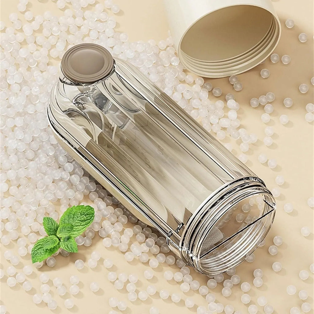 Beige foldable dog water bottle with integrated food container for outdoor walks.
