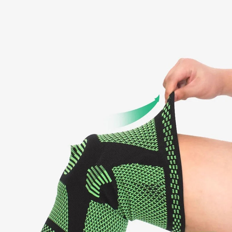 Green silicone spring sports knee pad shown on leg with size measurement indicators