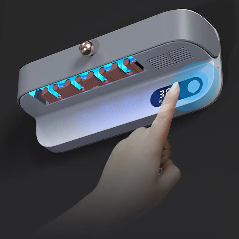 White wall-mounted smart toothbrush sterilizer with UV disinfection and USB charging port
