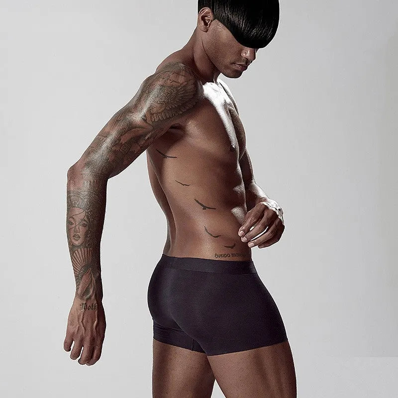 Seamless modal men's underwear brief in green colour showing mid-waist fit
