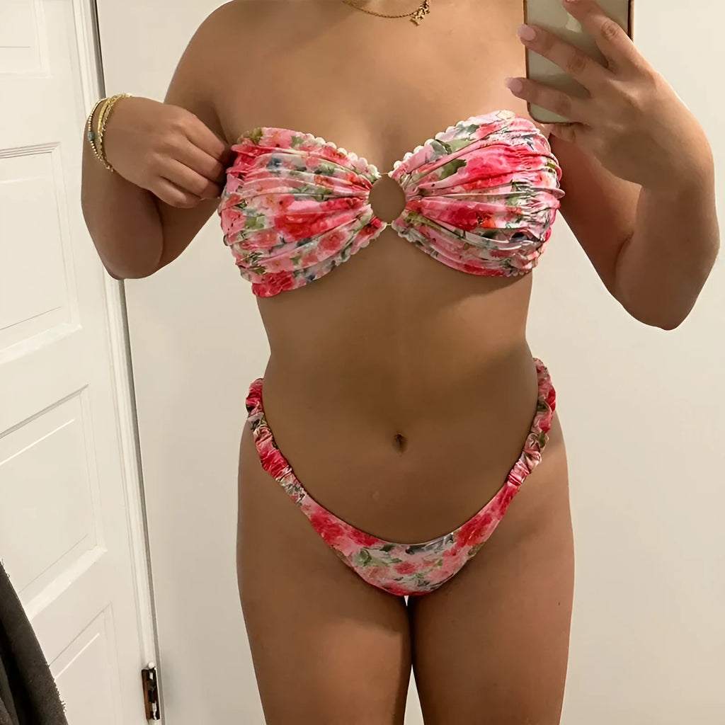 Women's floral print bikini set with lace trim on tube top and briefs in blue colour