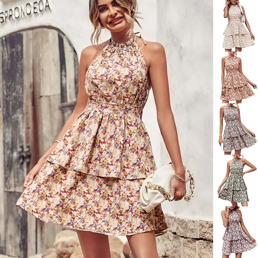 Woman wearing a backless halter neck A-line summer dress with boho ruffled print.