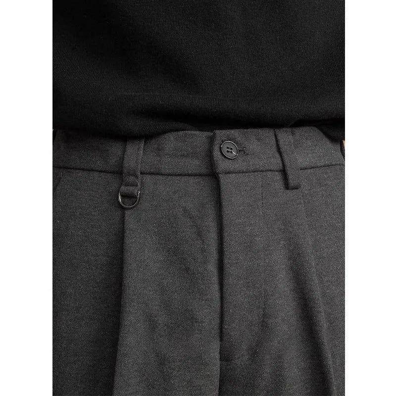 Men's straight-leg suit trousers in black, brown, grey, or khaki, shown on a model.