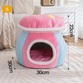 Grey mushroom-shaped plush cat bed on a wooden floor.