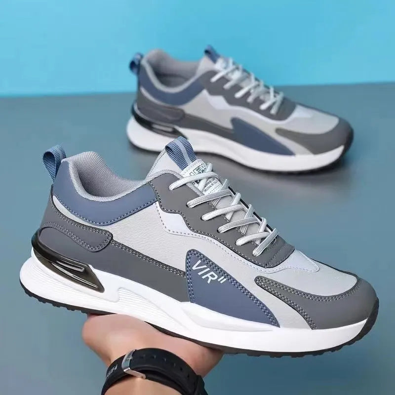 Men's low-top lace-up sneakers with colour block mesh upper and injection moulded sole.