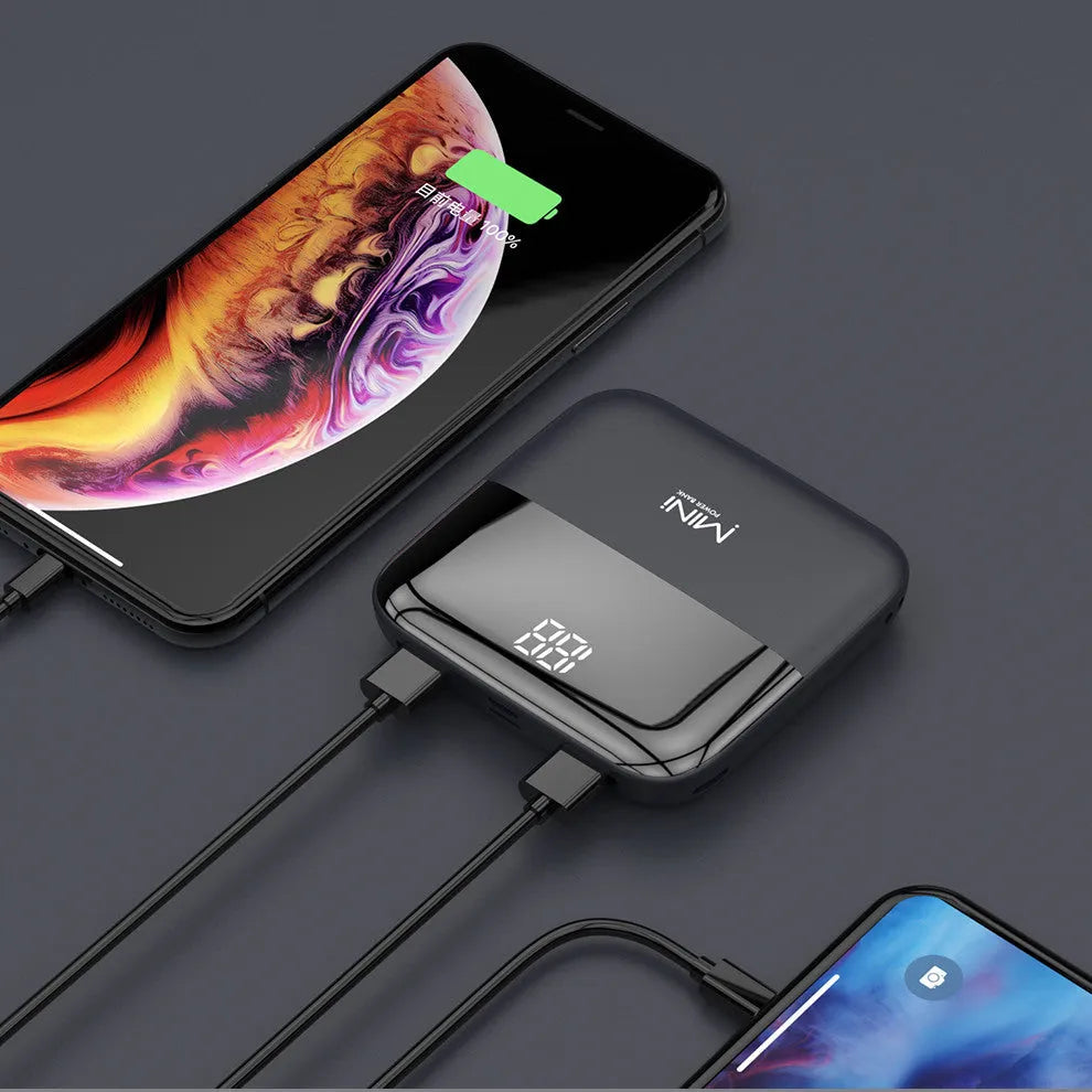 Android portable power bank with digital display showing battery percentage