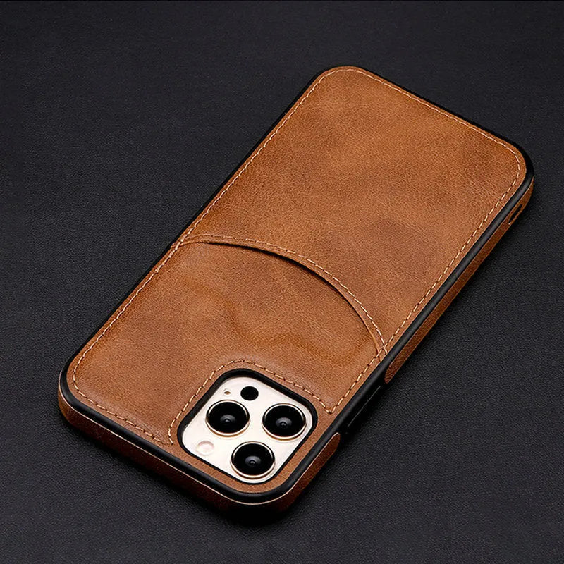 Dark blue PU leather protective case for iPhone models on a table.