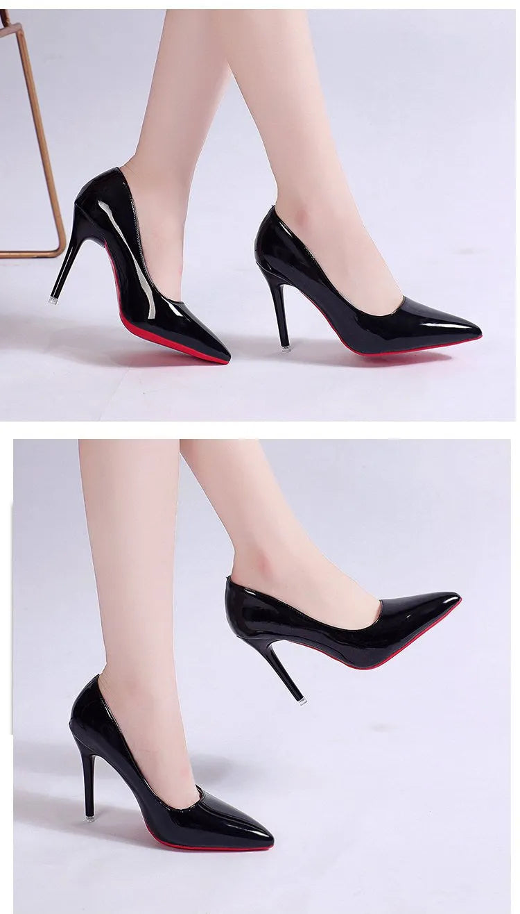 Women's black stiletto heel pump with pointed toe and shallow mouth design on a white background.
