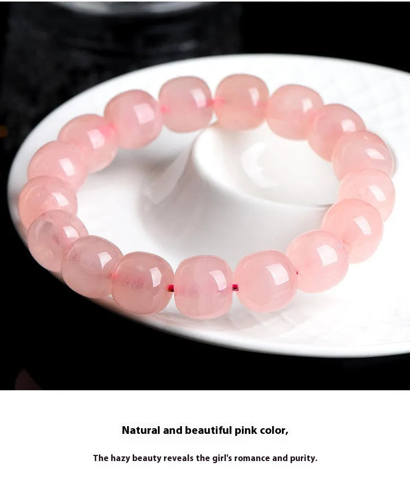 Natural pink crystal barrel bead bracelet with geometric 8x10mm beads