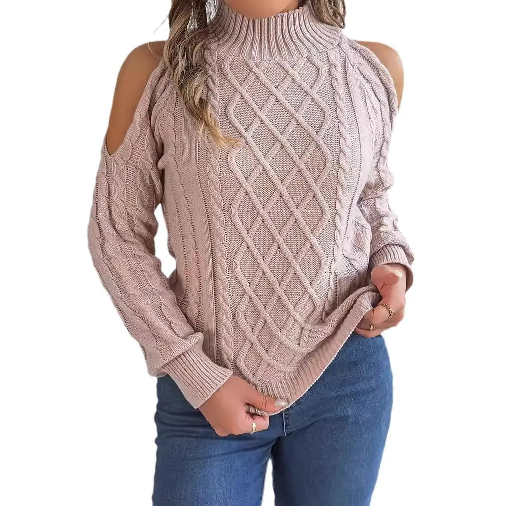 Woman wearing a gray twisted pattern sweater with a strapless half-high collar and long lantern sleeves.
