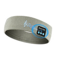 Bluetooth sports headband with integrated wireless earphones and removable washable cover