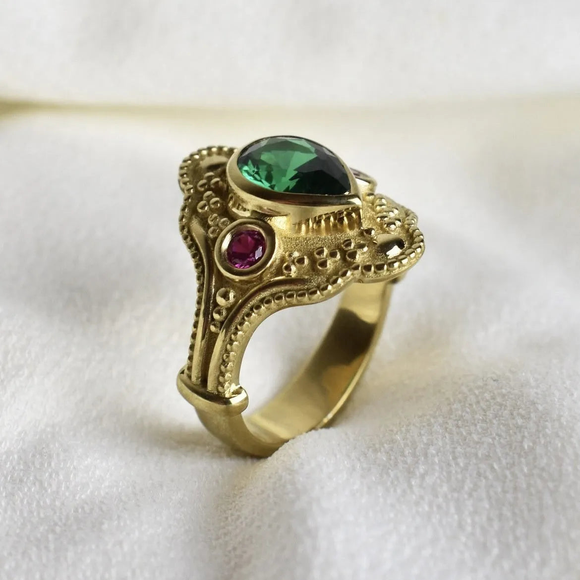 Golden geometric women's fashion ring on a plain background, showing its gold-plated alloy construction and ins style design.