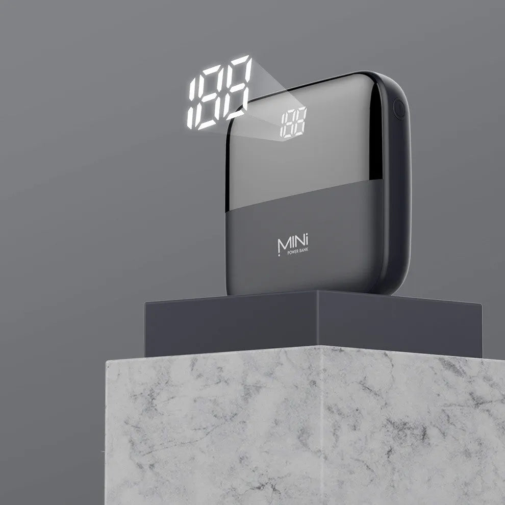 Android portable power bank with digital display showing battery percentage