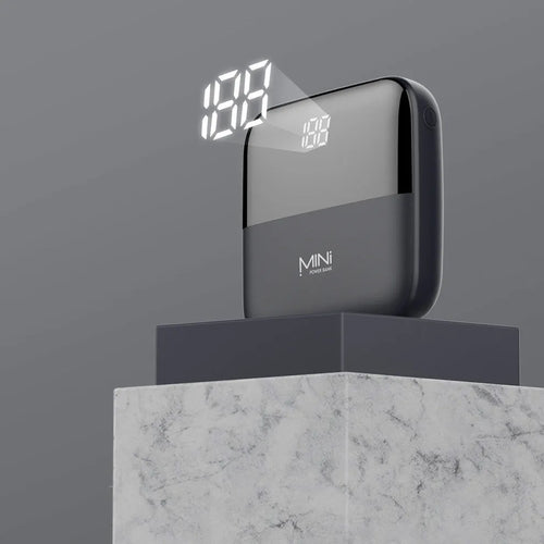 Android portable power bank with digital display showing battery percentage