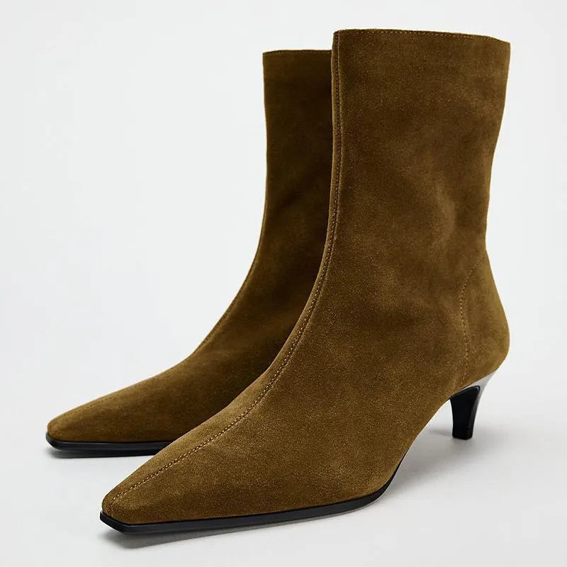 Brown women's square toe ankle boots with a side zip and a mid-height stiletto heel.