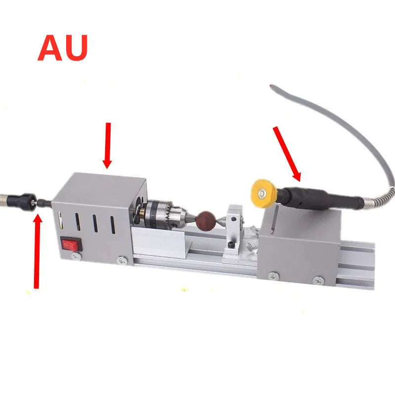 Compact metal manual woodworking lathe on workbench with carving knives