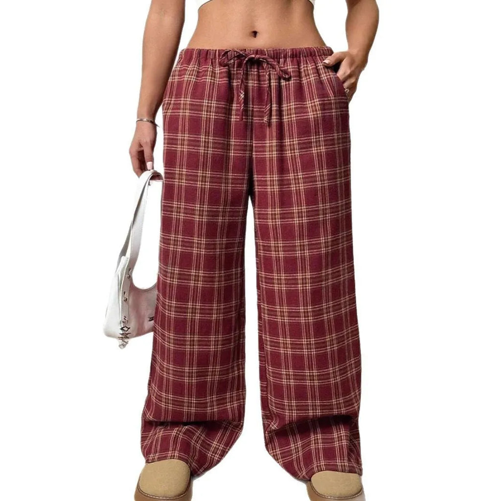 Women's loose fit plaid trousers with drawstring waistband and side pockets in blue colour