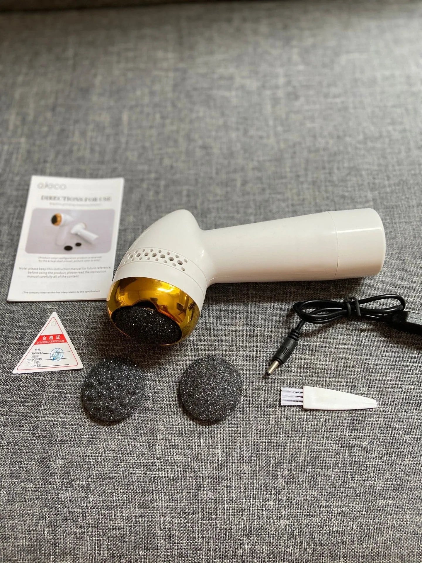 Electric foot grinder with quartz grinding head in gold, pink gold, and white silver colour options