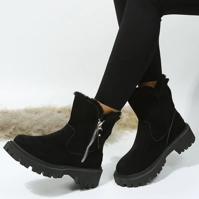 Women's black faux suede high-top snow boots with thick plush lining and a side zipper