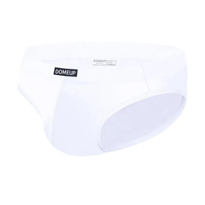 Men's low waist seamless briefs in black, white, and pink solid colours