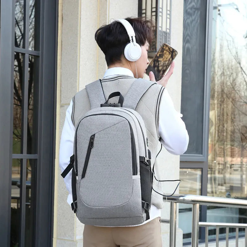 Solid colour oxford cloth computer backpack for men with street trend style and 20-35 litre capacity