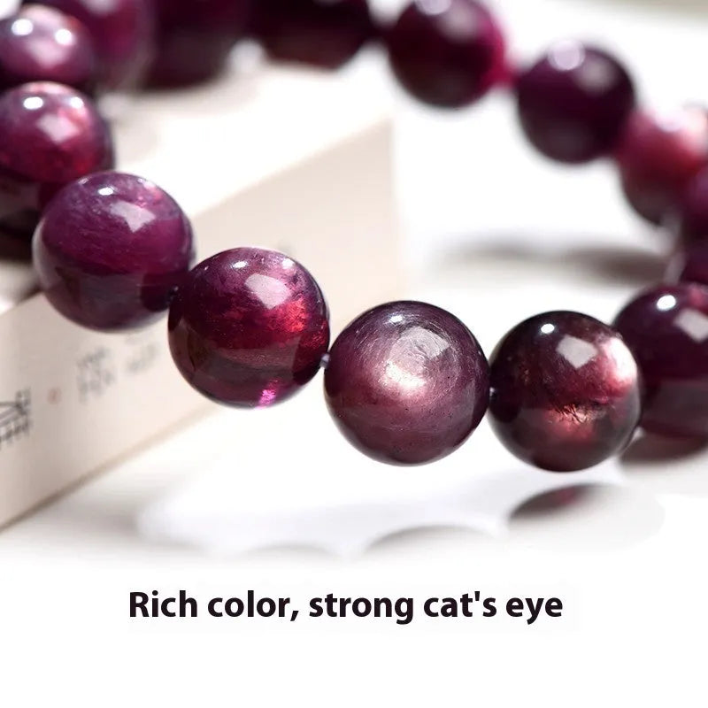 Natural purple lepidolite crystal bracelet with polished round beads in various size options.