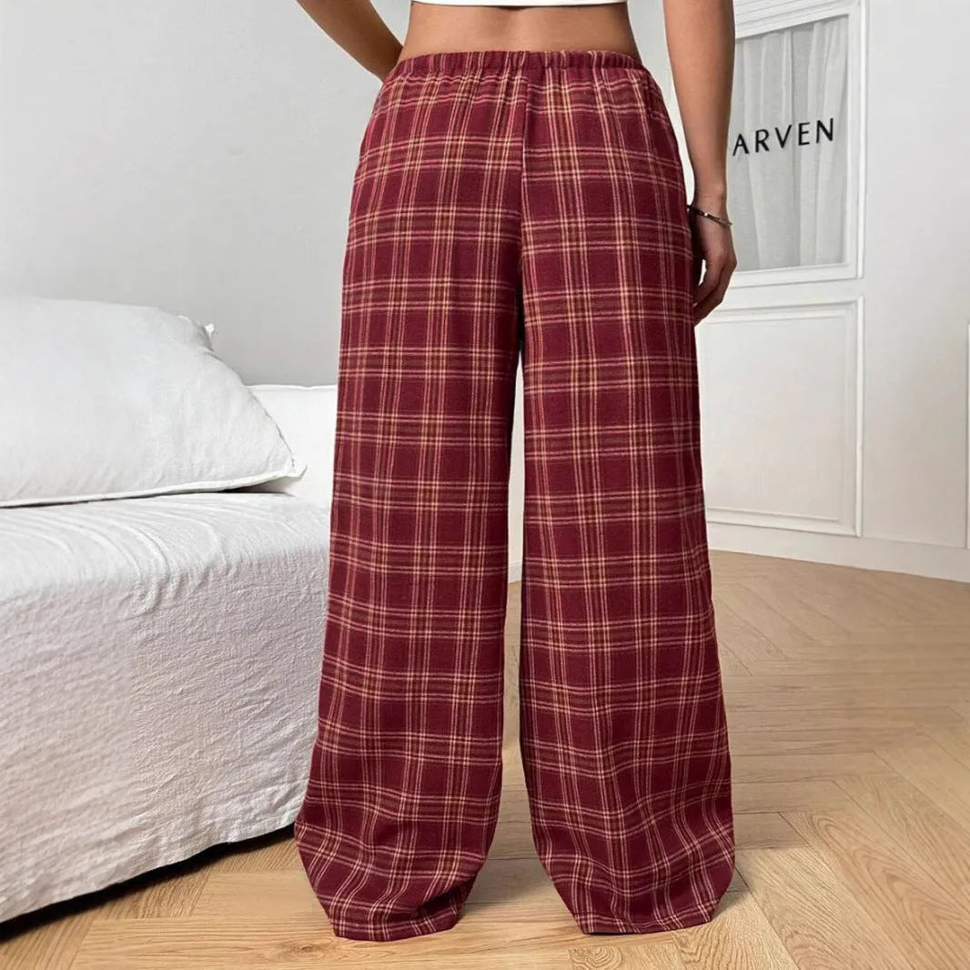 Women's loose fit plaid trousers with drawstring waistband and side pockets in blue colour
