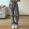 Women's blue high waist straight leg jeans with silver contrast detailing on denim fabric
