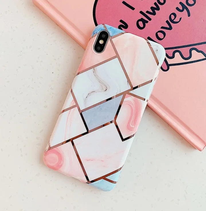 Clear and coloured silicone phone case for Apple iPhone models on a table
