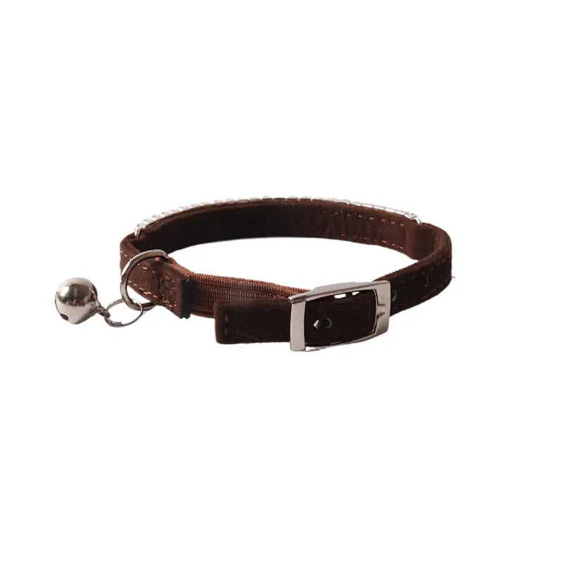 Soft flocking cat collar with elastic buckle in one of six colours on a white background.