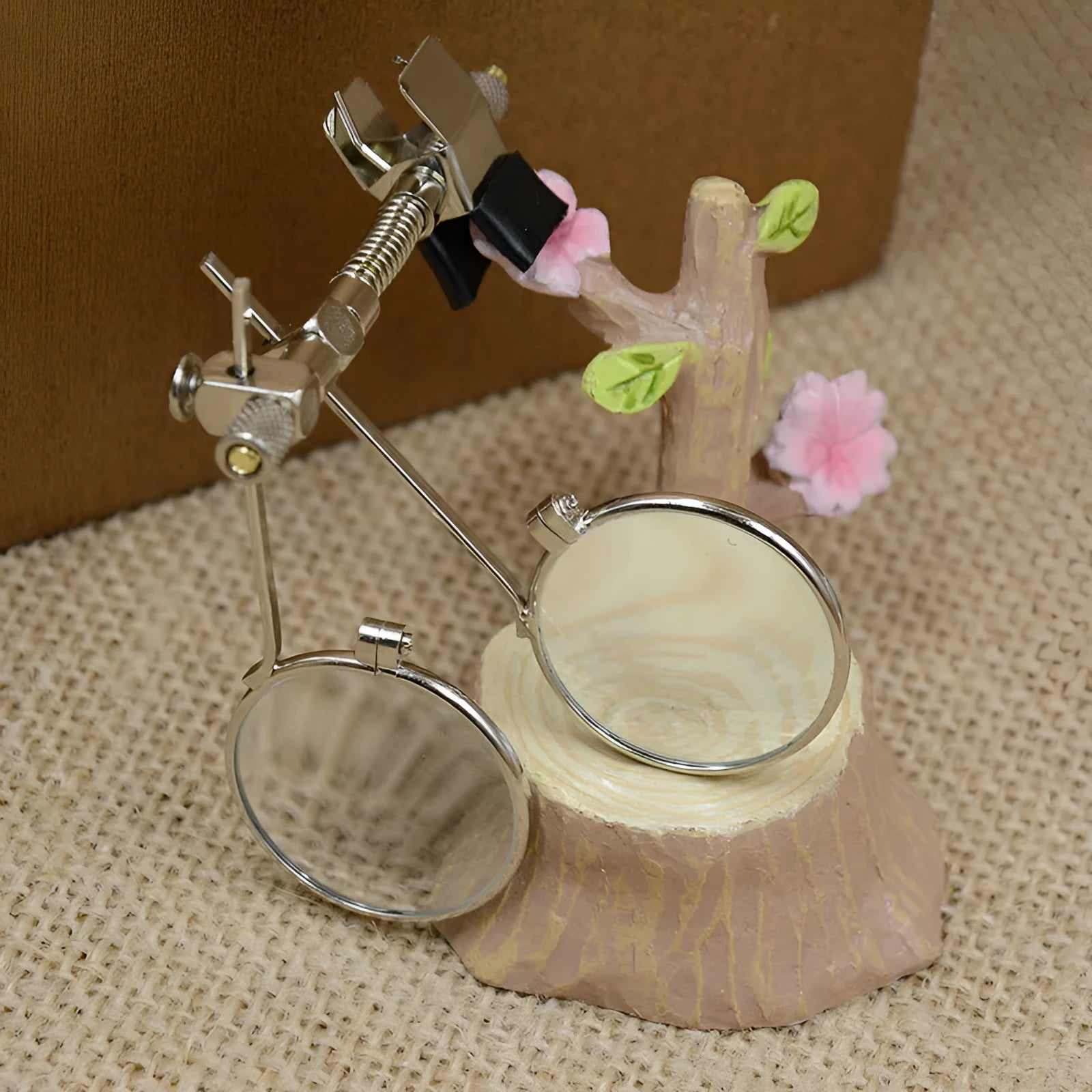 Reading glasses mirror clip attachment with double metal clips and glass auxiliary lenses.