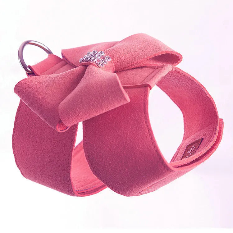 Adjustable puppy chest strap with bowknot design in microfiber material showing pink blue orange colour options